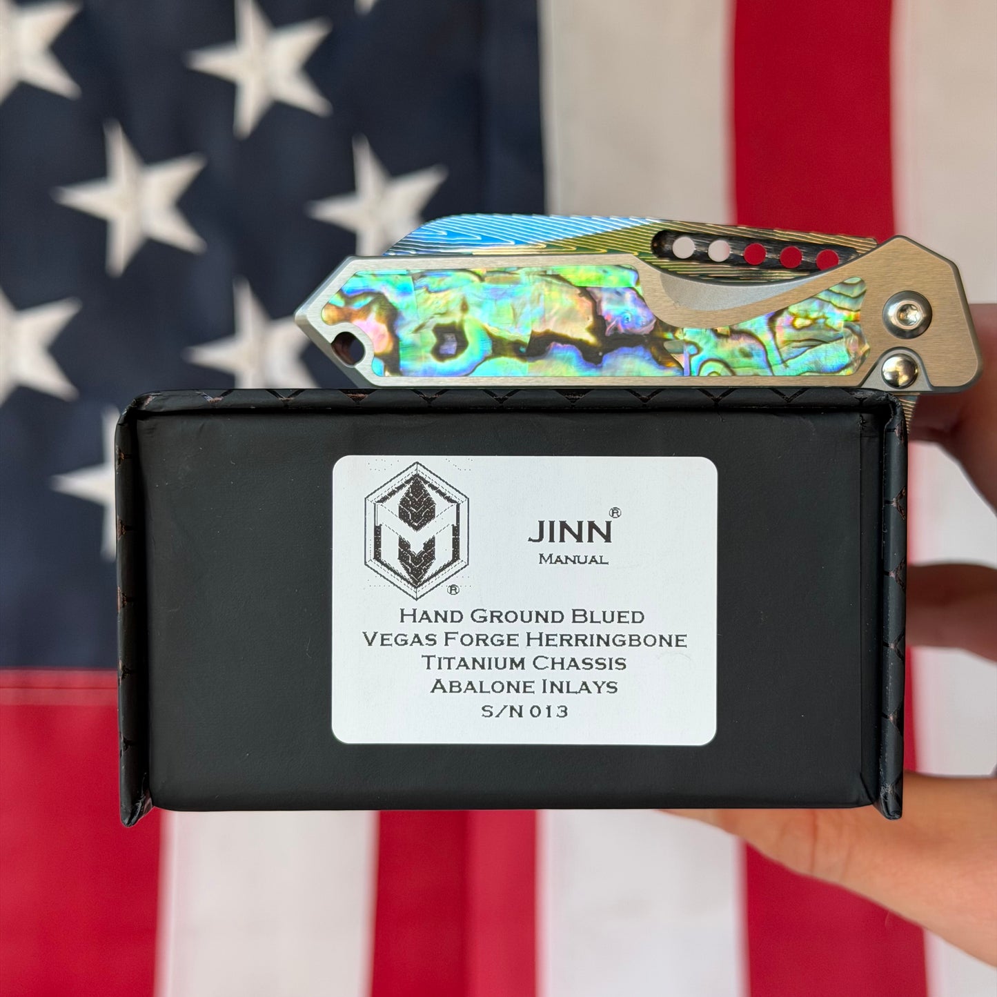 Heretic Knives Jinn Manual Knife – Titanium Chassis, Vegas Forge Herringbone Damascus, Hand Ground Blued Blade, Abalone Inlays – Serialized – Made in USA (S/N 013)