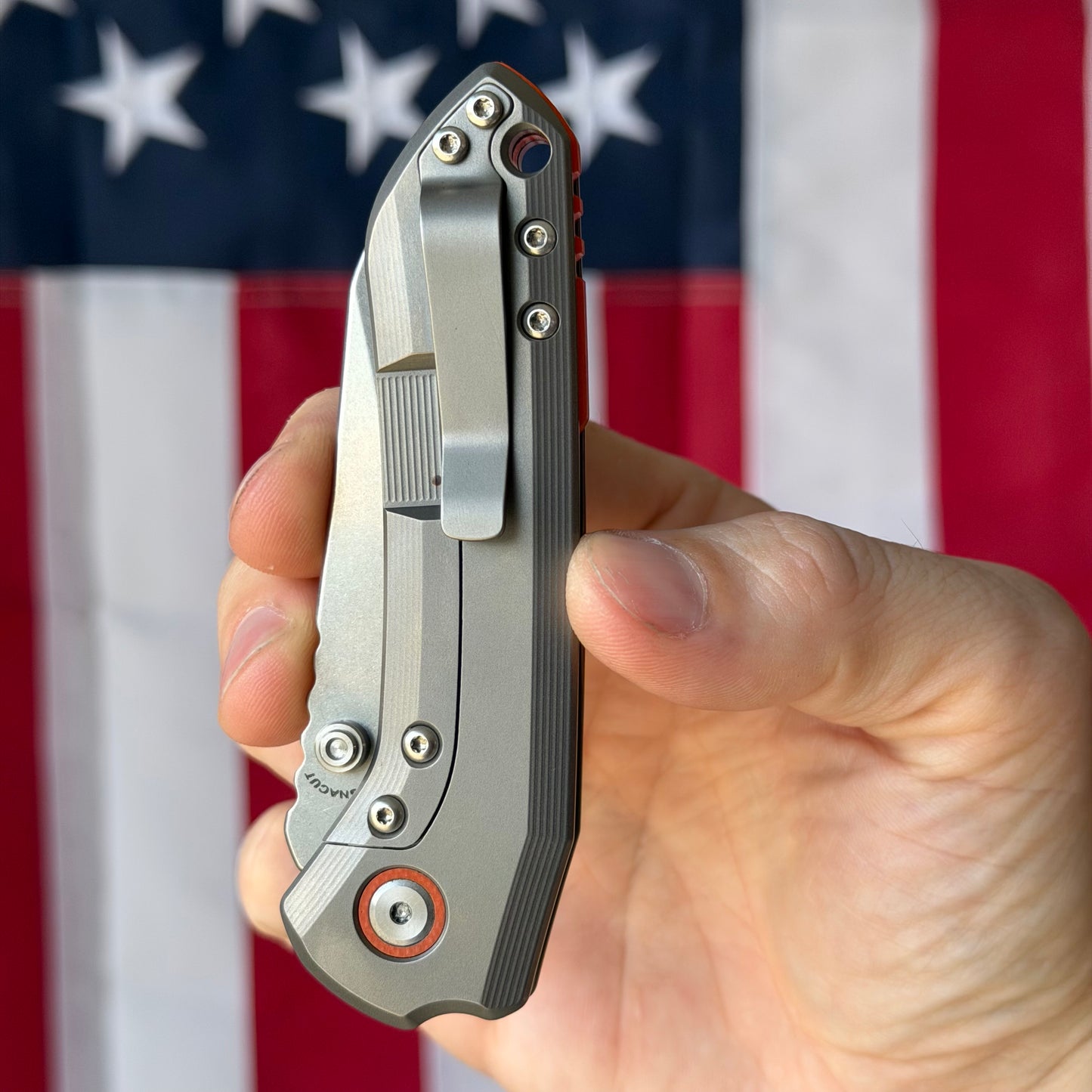 Millit Overland Folder 3.17″ Ti Frame Lock – Full Titanium Handle, Orange Backspacer & Pivot Collar, Magnacut Sheepsfoot – Made in USA