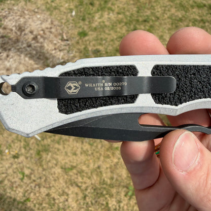 Heretic Blizzard Wraith V4 SE Manual Knife – 3.7″ MagnaCut Battleworn Black Blade, Blue Titanium Collar – Made in USA