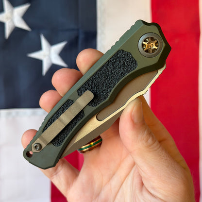 Heretic Wraith SE Automatic Knife – 3.5″ MagnaCut Blade, Bronze with OD Green Chassis – Made in USA (H000-7A-GRN)