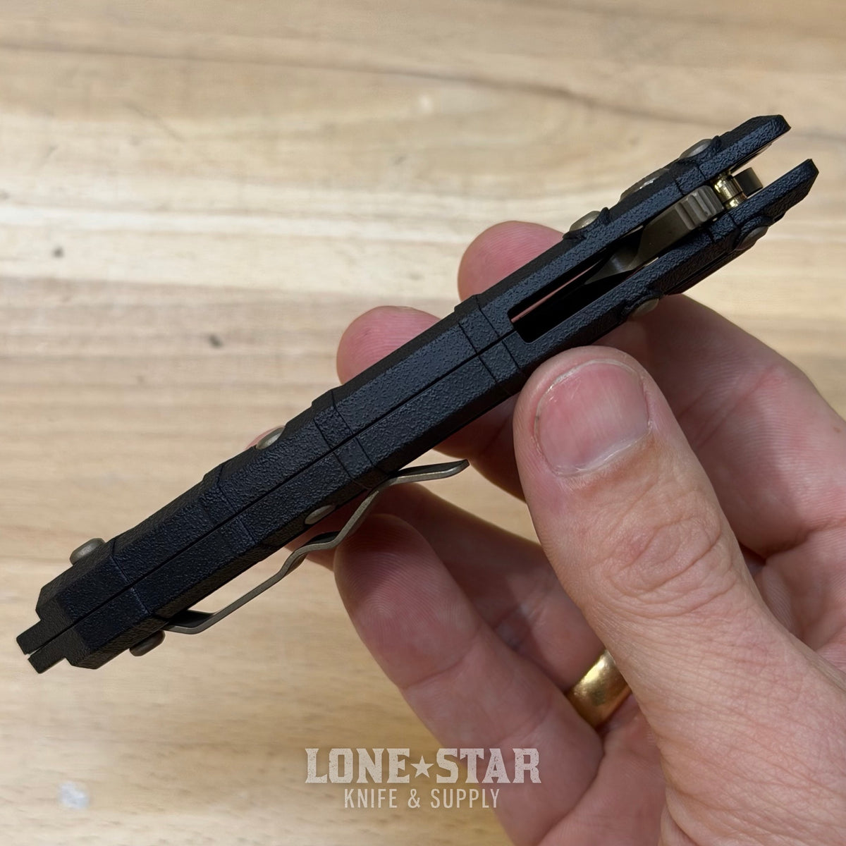 Heretic Martyr Tanto Manual Knife - Black Polymer, 3.5" Bronze MagnaCut Tanto, Button Lock - Made in USA (H057-7A)