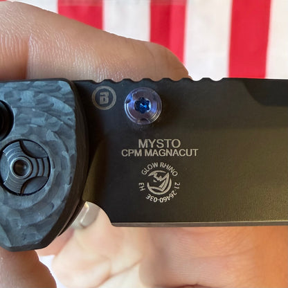 Hogue Mysto (Collector Series) 3.4″ Drop Point Knife, Carbon Fiber Handle with Blue Tritium Insert, Black Cerakote Blade, Made in USA (24492-LIM)