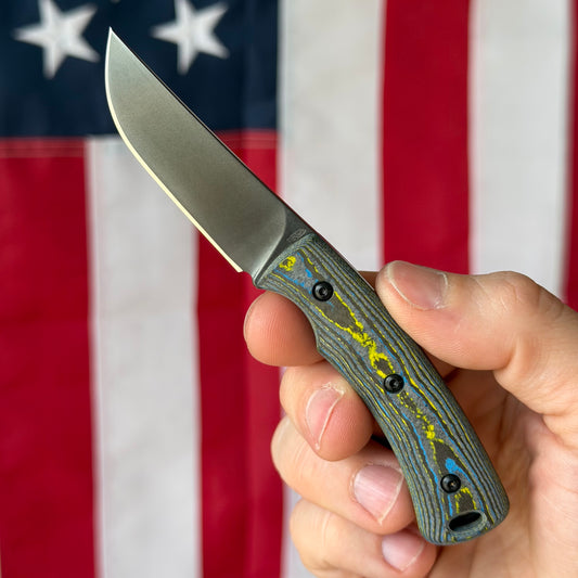 TRM Tagalong Special Edition DLC Fixed Blade Knife – MagnaCut, Bolts Camo Carbon Fiber Scales, Black Leather Sheath – Made in USA