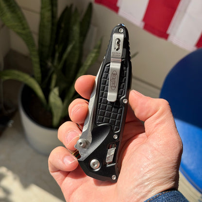 Microtech SOCOM Elite RAM-LOK™ Knife, Partially Serrated Stonewash Clip Point Blade, Black Frag Aluminum Handle, 3.8″, Made in USA (160RL-11FR)