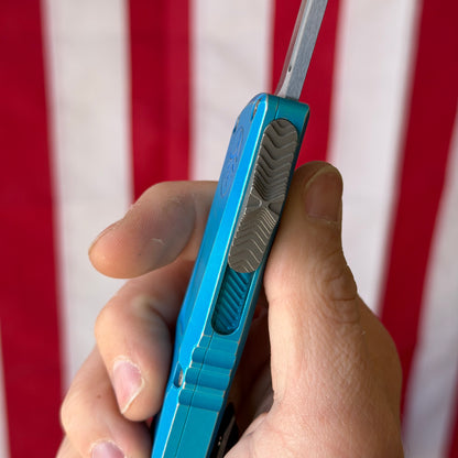 The Back Door: Combat Troodon Gen III S/E OTF Automatic Knife – Marbled Blue Aluminum Handle, 4″ Bohler M390MK (1143-10 MBL) (Used)