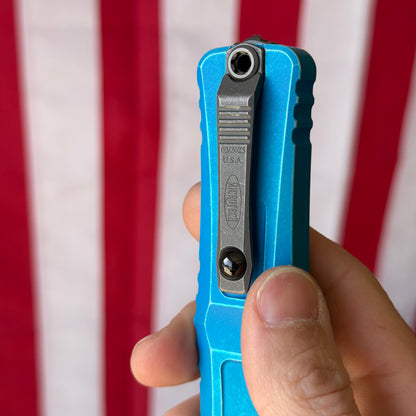 The Back Door: Combat Troodon Gen III S/E OTF Automatic Knife – Marbled Blue Aluminum Handle, 4″ Bohler M390MK (1143-10 MBL) (Used)