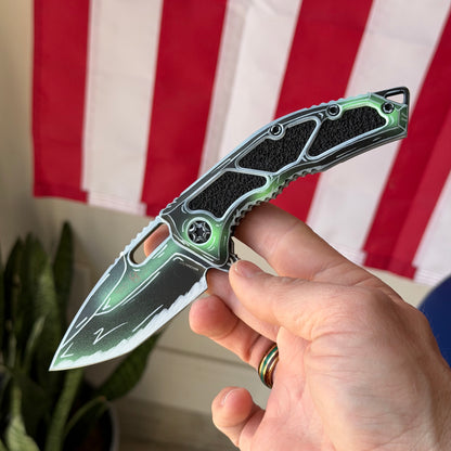 The Back Door: Heretic Medusa Manual Knife - Toxic Green Negative Cel Shade, 3″ MagnaCut Tanto, Cerakote Blade and Handle - Made in USA (H009-NCS-TX) (Return)