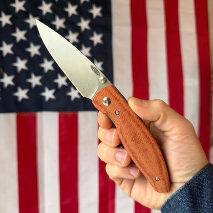The Back Door: TRM ATOM LL - Autumn Orange Micarta 3D Contoured Smooth, MagnaCut Blade (Blemish)