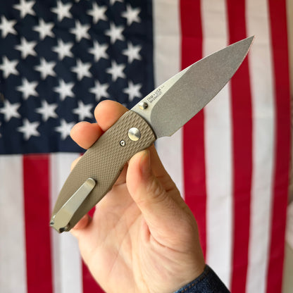 The Back Door: TRM Neutron 2 LL - Earth Brown G10 3D Contoured Lizard Skin, Mike IRIE MagnaCut Blade (Blemish)