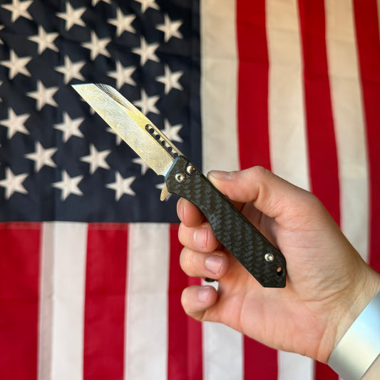 Heretic Knives Jinn Manual Knife – Carbon Fiber Chassis, Vegas Forge Vines & Roses Damascus, Hand Ground Polished Blade, Flamed Titanium Clip – Serialized – Made in USA (S/N 017)