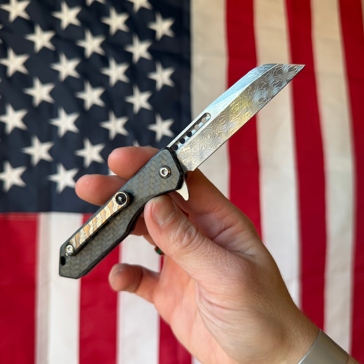 Heretic Knives Jinn Manual Knife – Carbon Fiber Chassis, Vegas Forge Vines & Roses Damascus, Hand Ground Polished Blade, Flamed Titanium Clip – Serialized – Made in USA (S/N 019)