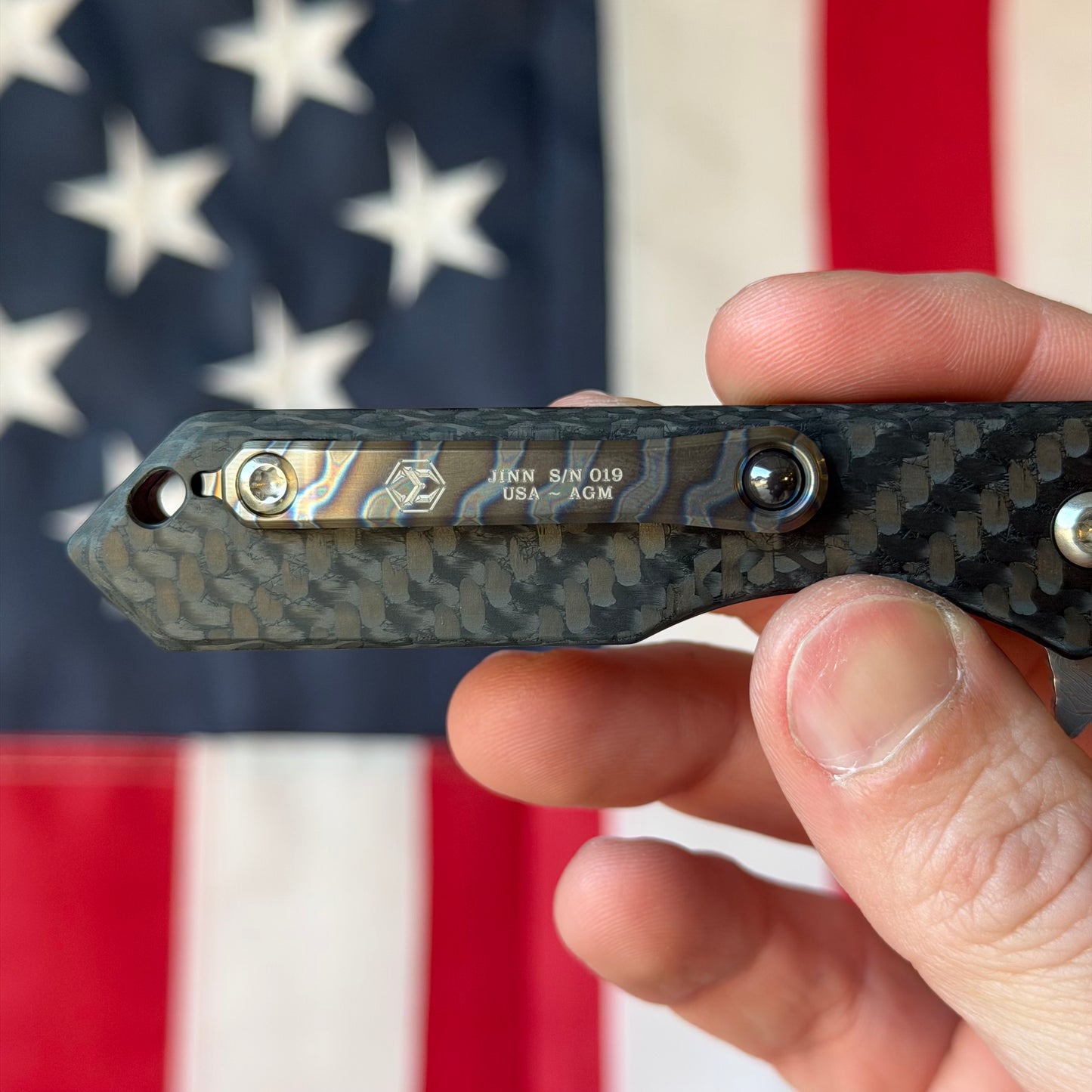 Heretic Knives Jinn Manual Knife – Carbon Fiber Chassis, Vegas Forge Vines & Roses Damascus, Hand Ground Polished Blade, Flamed Titanium Clip – Serialized – Made in USA (S/N 019)
