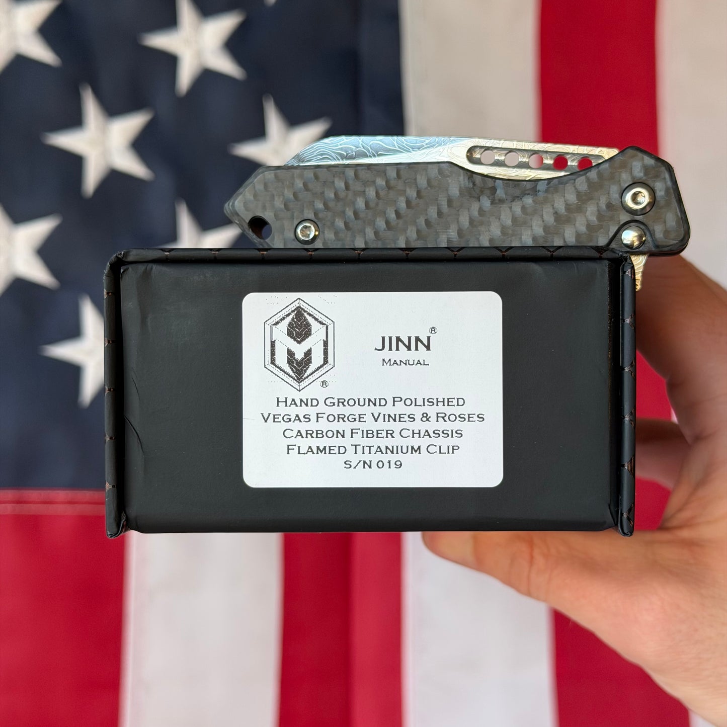 Heretic Knives Jinn Manual Knife – Carbon Fiber Chassis, Vegas Forge Vines & Roses Damascus, Hand Ground Polished Blade, Flamed Titanium Clip – Serialized – Made in USA (S/N 019)