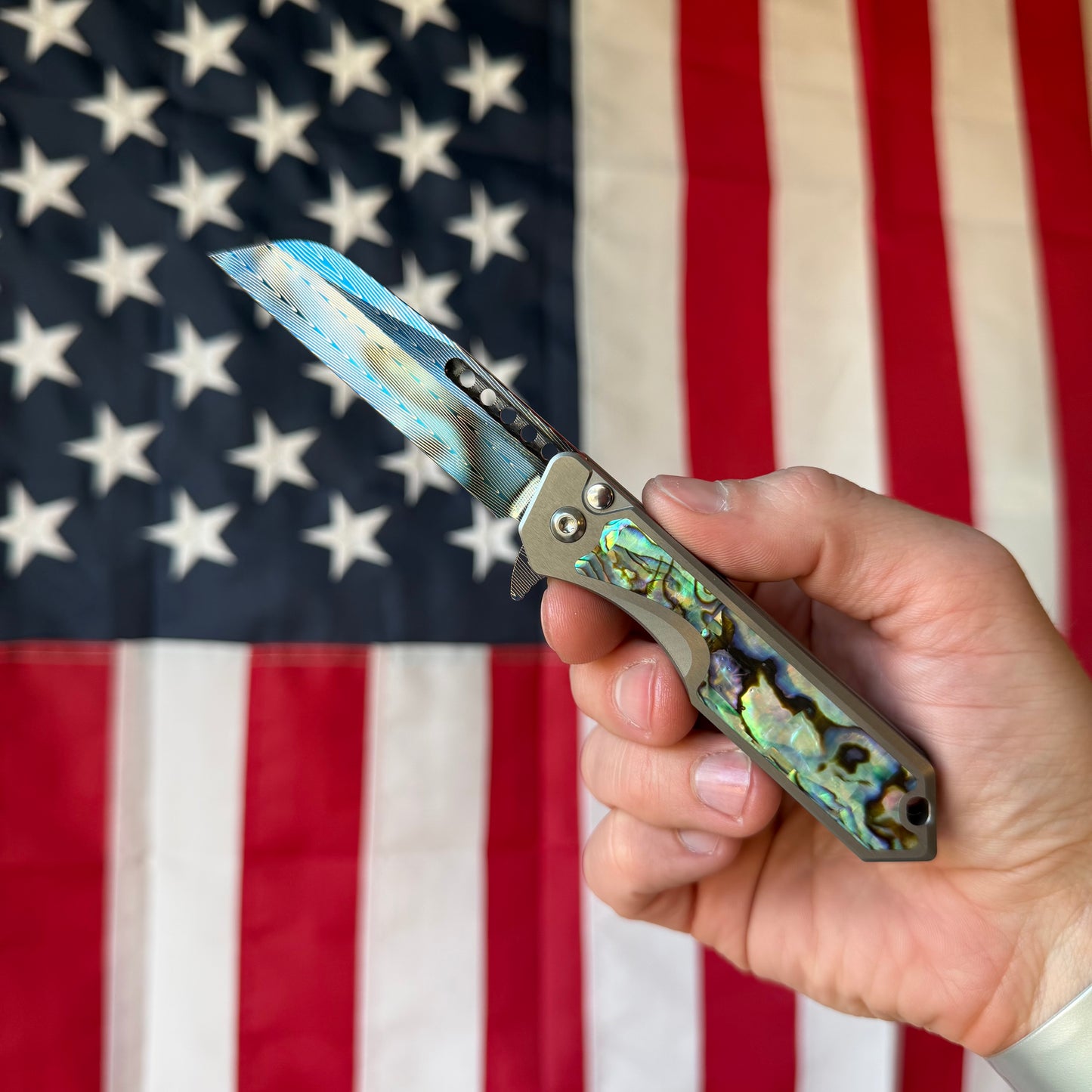 Heretic Knives Jinn Manual Knife – Titanium Chassis, Vegas Forge Herringbone Damascus, Hand Ground Blued Blade, Abalone Inlays – Serialized – Made in USA (S/N 013)