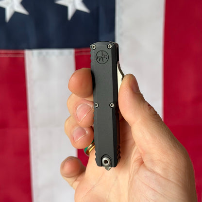 Microtech UTX-70 Gen IV DE Black Aluminum, 3.1″ M390MK Blade, Stonewashed, Made in USA (11474-10)