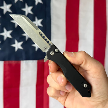 Heretic Jinn Manual 3.0" Button Lock Flipper – Battleworn MagnaCut, Black Chassis – Made in USA (H213-5A)