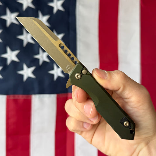 Heretic Jinn Manual 3.0" Button Lock Flipper – Bronze MagnaCut, OD Green Chassis – Made in USA (H213-7AGRN)