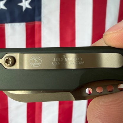 Heretic Jinn Manual 3.0" Button Lock Flipper – Bronze MagnaCut, OD Green Chassis – Made in USA (H213-7AGRN)