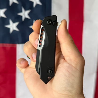 Heretic Jinn Manual 3.0" Button Lock Flipper – 2-Tone MagnaCut, Black Tactical Chassis – Made in USA (H213-10A-T)