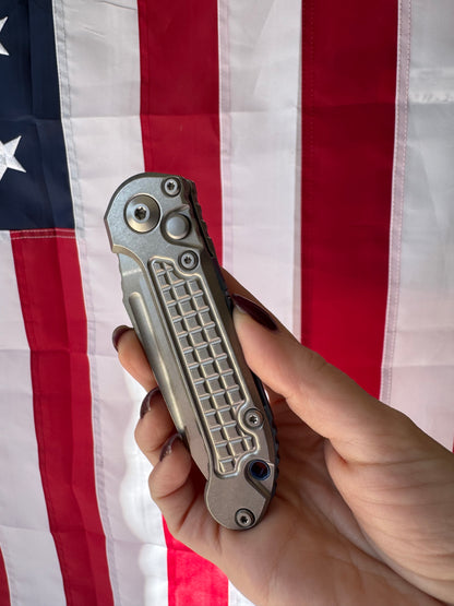 Microtech L.U.D.T. Mixed Edge Tanto 3.5 inch Automatic Knife, Stonewash Blade, Frag Pattern Titanium Handle with Blue Accents – Made in USA (1136-12FRMS2)