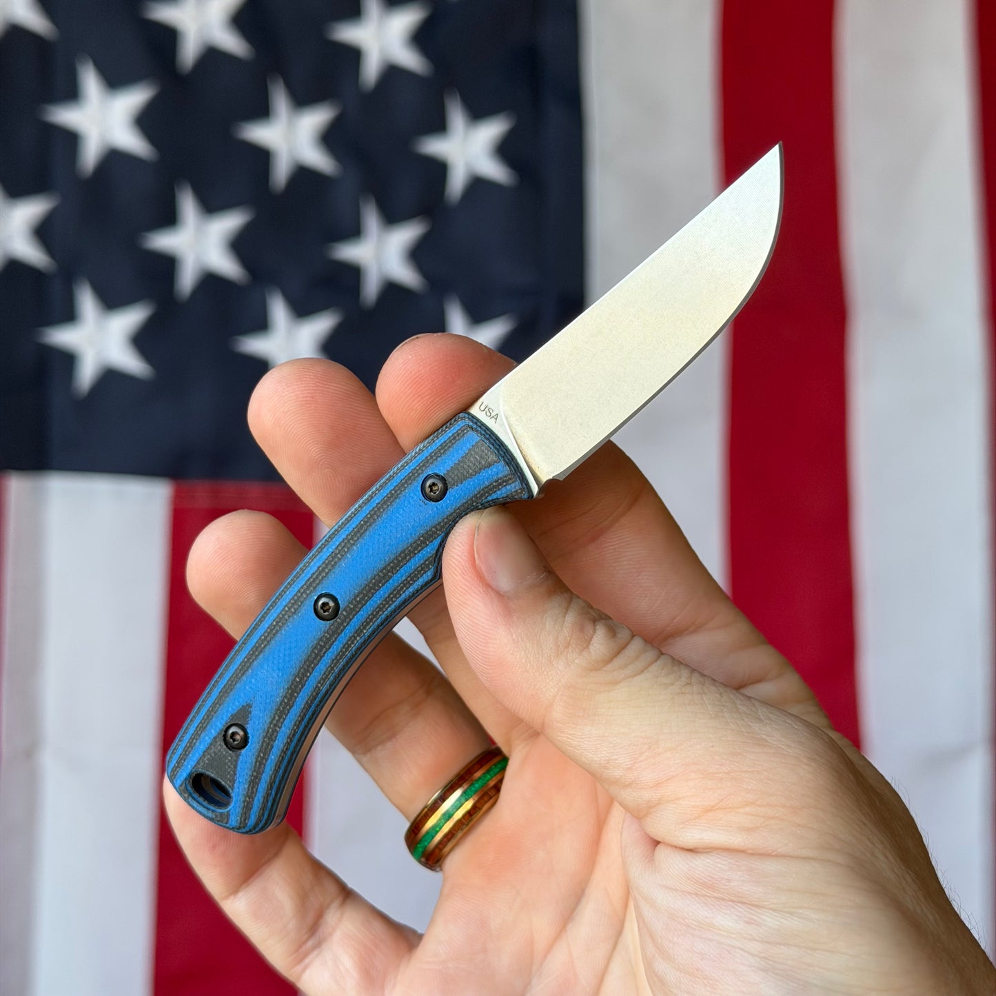 TRM TAGALONG 2.44" Fixed Blade – Ocean Ripple Black & Blue G10, MagnaCut Tumbled, Leather Taco Sheath – Made in USA