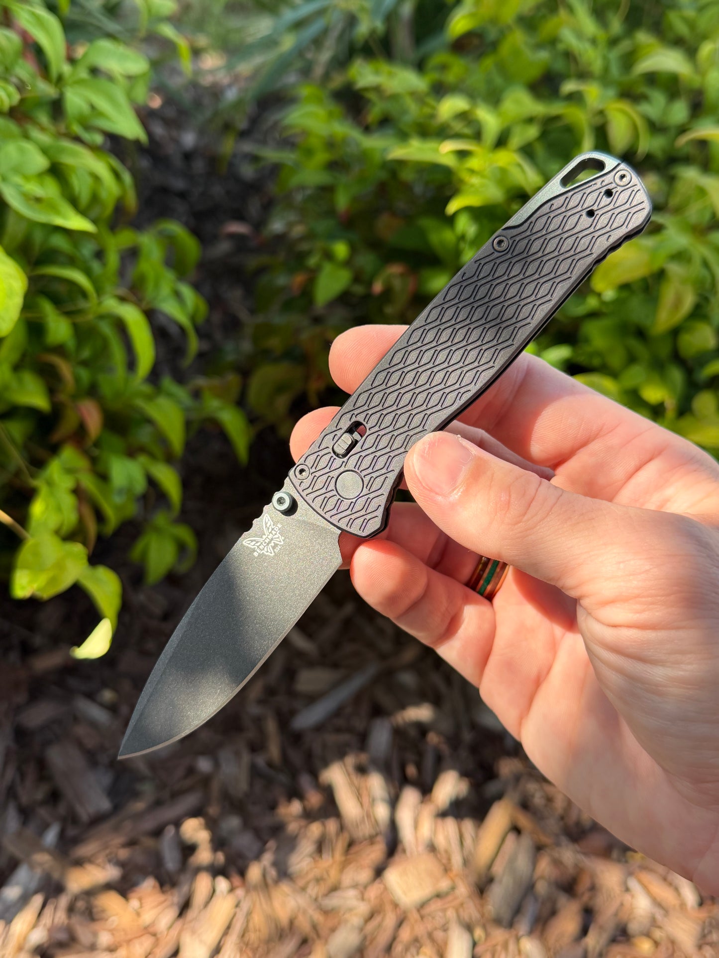 Benchmade Bugout Vapyr 3.25" AXIS Lock – Black Aluminum, MagnaCut Black Cerakote, Taiga Green Accents – Made in USA (534BK)