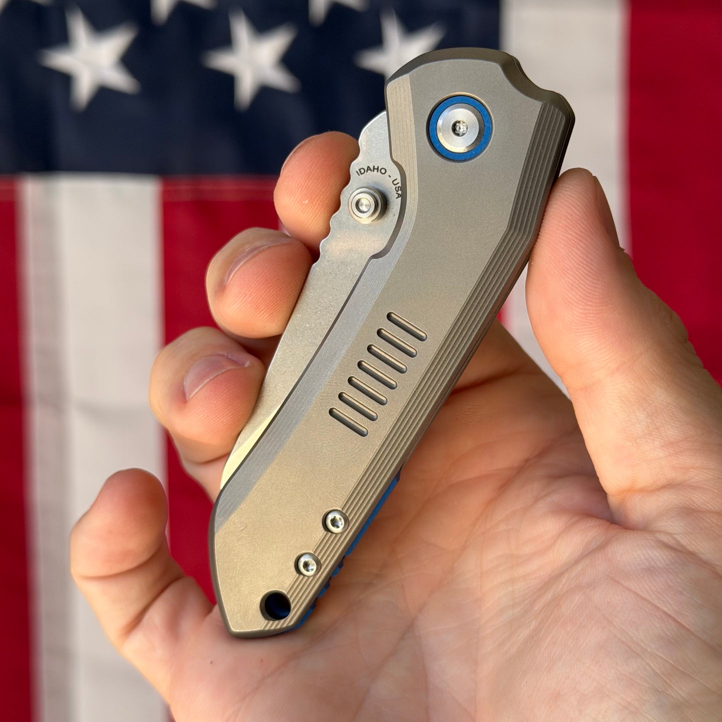 Millit Overland Folder 3.17″ Ti Frame Lock – Full Titanium Handle, Blue Backspacer & Pivot Collar, Magnacut Sheepsfoot – Made in USA