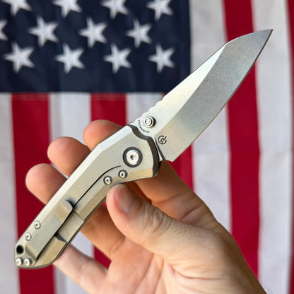 Millit Overland Folder 3.17″ Ti Frame Lock – Full Titanium Handle, Black Backspacer & Pivot Collar, Magnacut Sheepsfoot – Made in USA