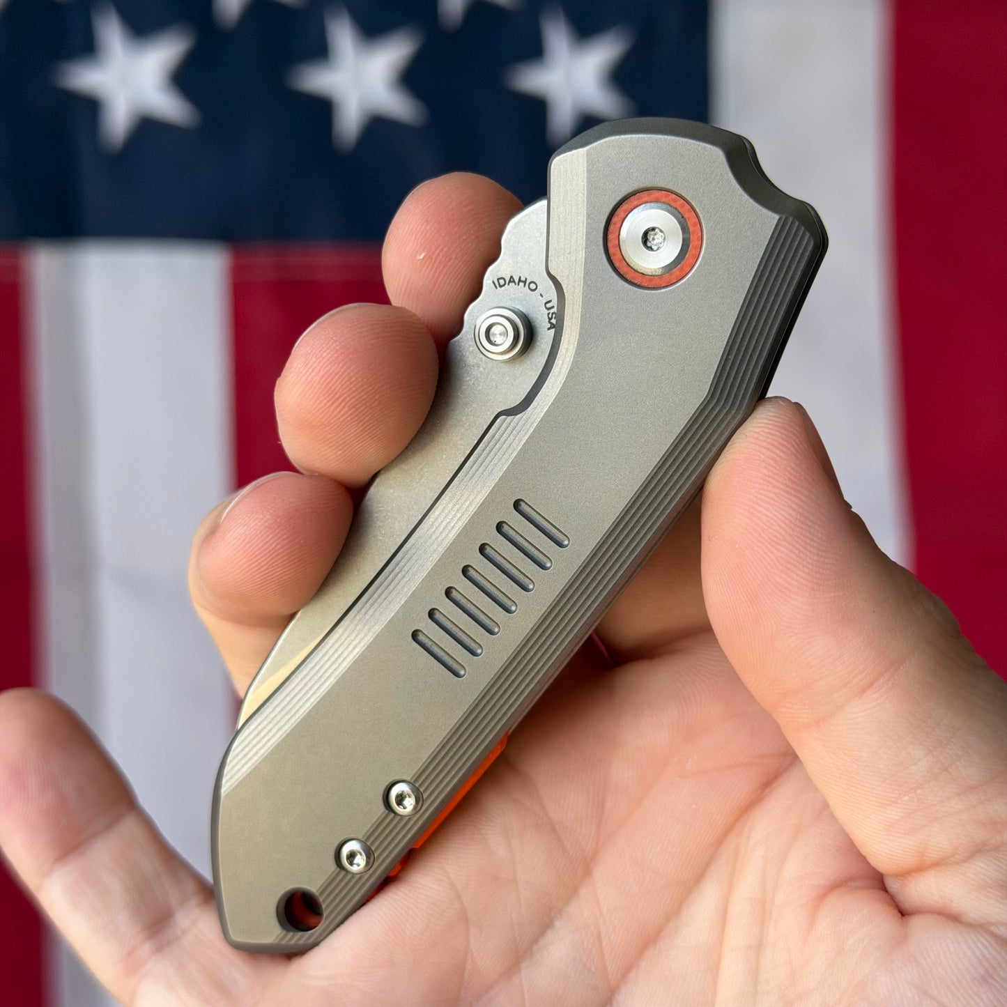 Millit Overland Folder 3.17″ Ti Frame Lock – Full Titanium Handle, Orange Backspacer & Pivot Collar, Magnacut Sheepsfoot – Made in USA