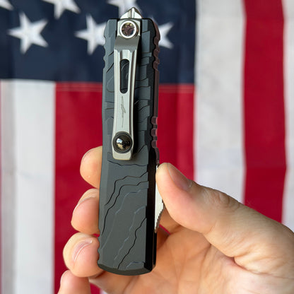 Microtech UTX-85 Gen IV Signature Series 3.11" OTF – Interceptor Blade, Black Topographic Deep Engraved Handle, M390MK Stonewash – BSA26 – Made in USA (12354TP-10S)