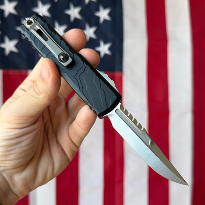 Microtech UTX-85 Gen IV Signature Series 3.11" OTF – Interceptor Blade, Black Topographic Deep Engraved Handle, M390MK Stonewash – BSA26 – Made in USA (12354TP-10S)