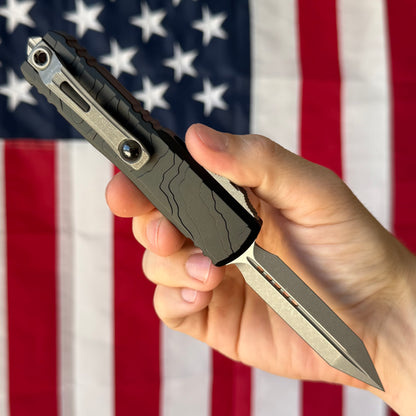 Microtech UTX-85 Gen IV 3.11" OTF – Spartan Blade, Black Topographic Deep Engraved Handle, M390MK Apocalyptic – BSA26 – Made in USA (12304TP-10AP)