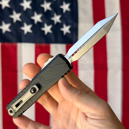 Microtech UTX-85 Gen IV 3.11" OTF – Spartan Blade, Black Topographic Deep Engraved Handle, M390MK Stonewash – BSA26 – Made in USA (12304TP-10)