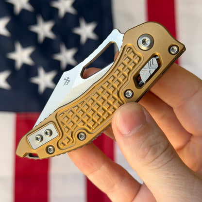 Microtech M-Stitch RAM-LOK 3.05" Manual – Tan Frag Aluminum, M390MK Stonewash – Made in USA (169MRL-10FRTA)