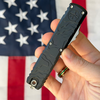 Microtech Ultratech Spartan Gen IV 3.5" OTF – Topographic Black Deep Engraved, M390MK Stonewash – Made in USA (12234TP-10)