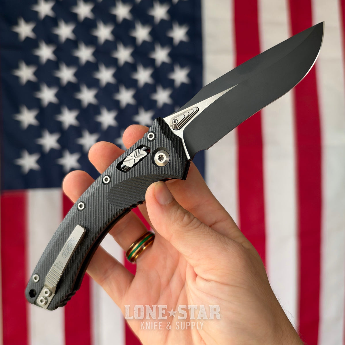 The Back Door: Microtech Amphibian Ram-Lok Manual Folder, 3.9" Two-Tone Black M390MK, Black Fluted G10 - Made in USA (137RL-1FLGTBK) (Used)