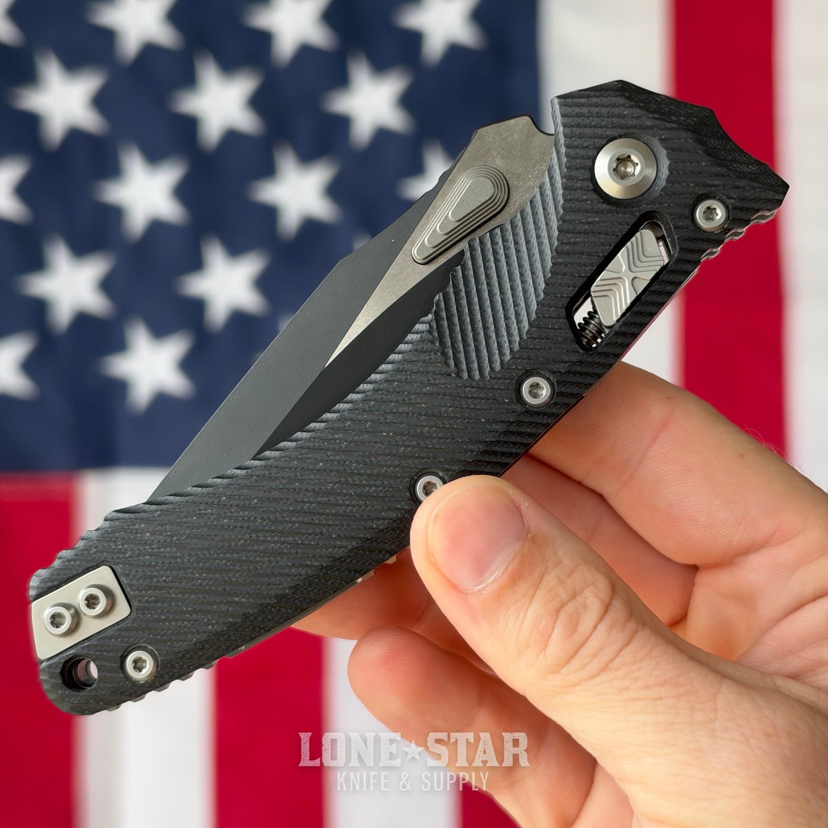 The Back Door: Microtech Amphibian Ram-Lok Manual Folder, 3.9" Two-Tone Black M390MK, Black Fluted G10 - Made in USA (137RL-1FLGTBK) (Used)