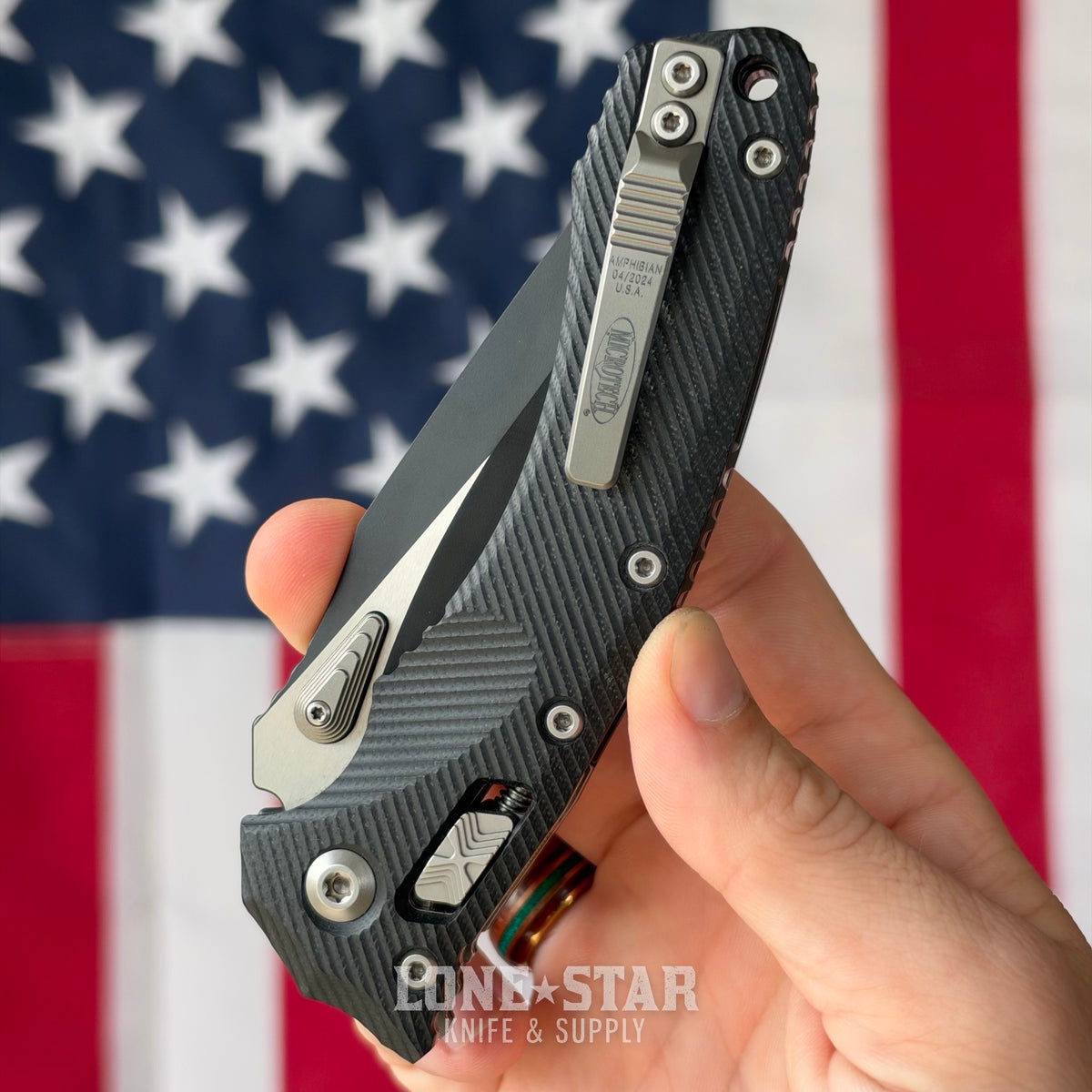 The Back Door: Microtech Amphibian Ram-Lok Manual Folder, 3.9" Two-Tone Black M390MK, Black Fluted G10 - Made in USA (137RL-1FLGTBK) (Used)