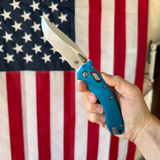 Microtech Amphibian Ram Lok S E Blue Aluminum Fluted, 4.0″ M390MK Blade, Made in USA (137RL-10FLBL)