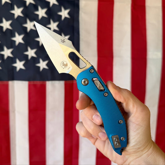 Stitch Ram‑Lok Knife – Blue Fluted Aluminum Handle, M390 MK Blade (Stonewash), RAM‑LOK Bar Lock – Made in USA (MCT18250 / 169RL‑10FLBL)