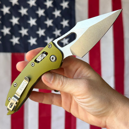 The Back Door: Used - Microtech Stitch RAM-LOK 169RL-10FLOD 3.625" Spear Point, M390MK Stonewash, OD Green Fluted Aluminum, Manual - Made in USA