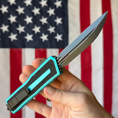 The Back Door: Used - Microtech Scarab II Gen III 1180-1TQ 3.875" D/E Drop Point, M390MK Black, Turquoise Aluminum, OTF Automatic - Made in USA