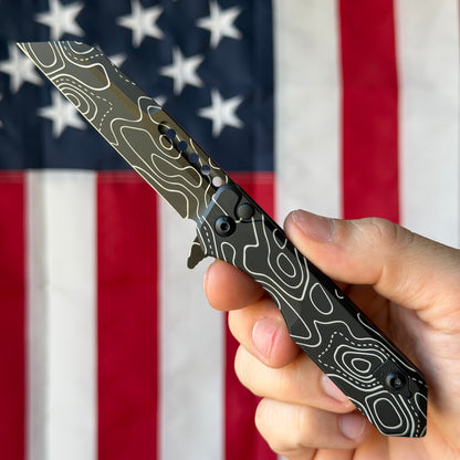 The Back Door: Used - Heretic Jinn Manual H213-TOPO 3.00" Wharncliffe, CPM-MagnaCut DLC, Deep Engraved Topo, Button Lock - Made in USA