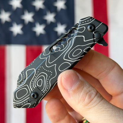The Back Door: Used - Heretic Jinn Manual H213-TOPO 3.00" Wharncliffe, CPM-MagnaCut DLC, Deep Engraved Topo, Button Lock - Made in USA