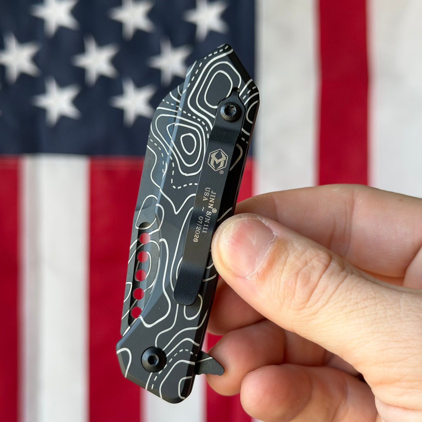 The Back Door: Used - Heretic Jinn Manual H213-TOPO 3.00" Wharncliffe, CPM-MagnaCut DLC, Deep Engraved Topo, Button Lock - Made in USA