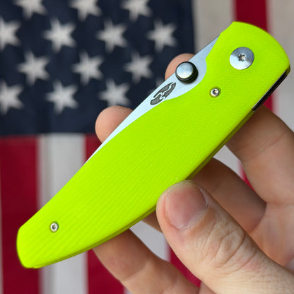 TRM ATOM Liner Lock - CPM-MagnaCut, Day Glo G10 3D Sunburst, Titanium Liners - Made in USA (DLR-ATM-G10-SB-DG)