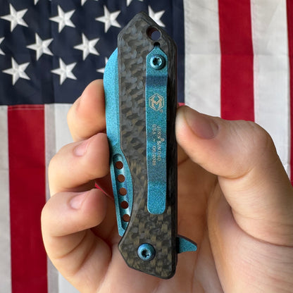 Heretic Jinn Manual - Metallic Teal Carbon Fiber, MagnaCut Wharncliffe - Made in USA (H213-MT-CF)