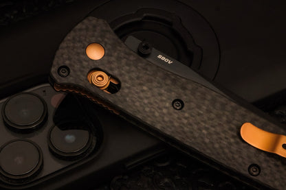 Benchmade Bailout 3.38" AXIS Lock – Carbon Fiber, CPM-S90V Black Cerakote Tanto, Dark Copper – Made in USA (537BK-10)